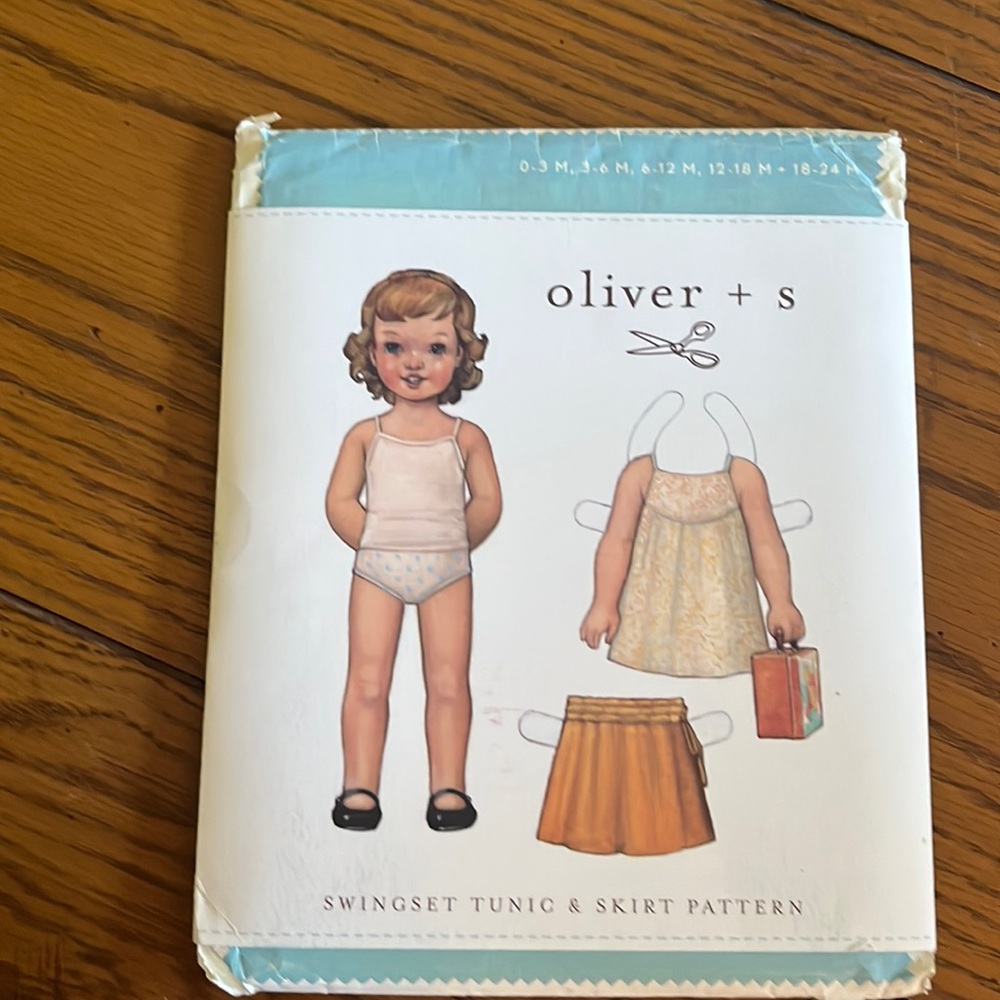 Oliver + s top and skirt sewing pattern for infant to 24 months